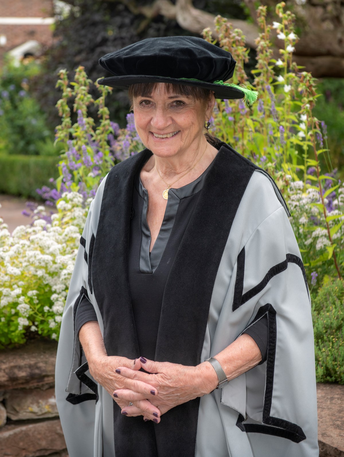 Dr. Julie Staun OBE, PhD, RN, OHN
